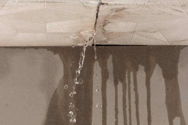Professional Flood Damage Cleanup technician working in East Rochester, NY